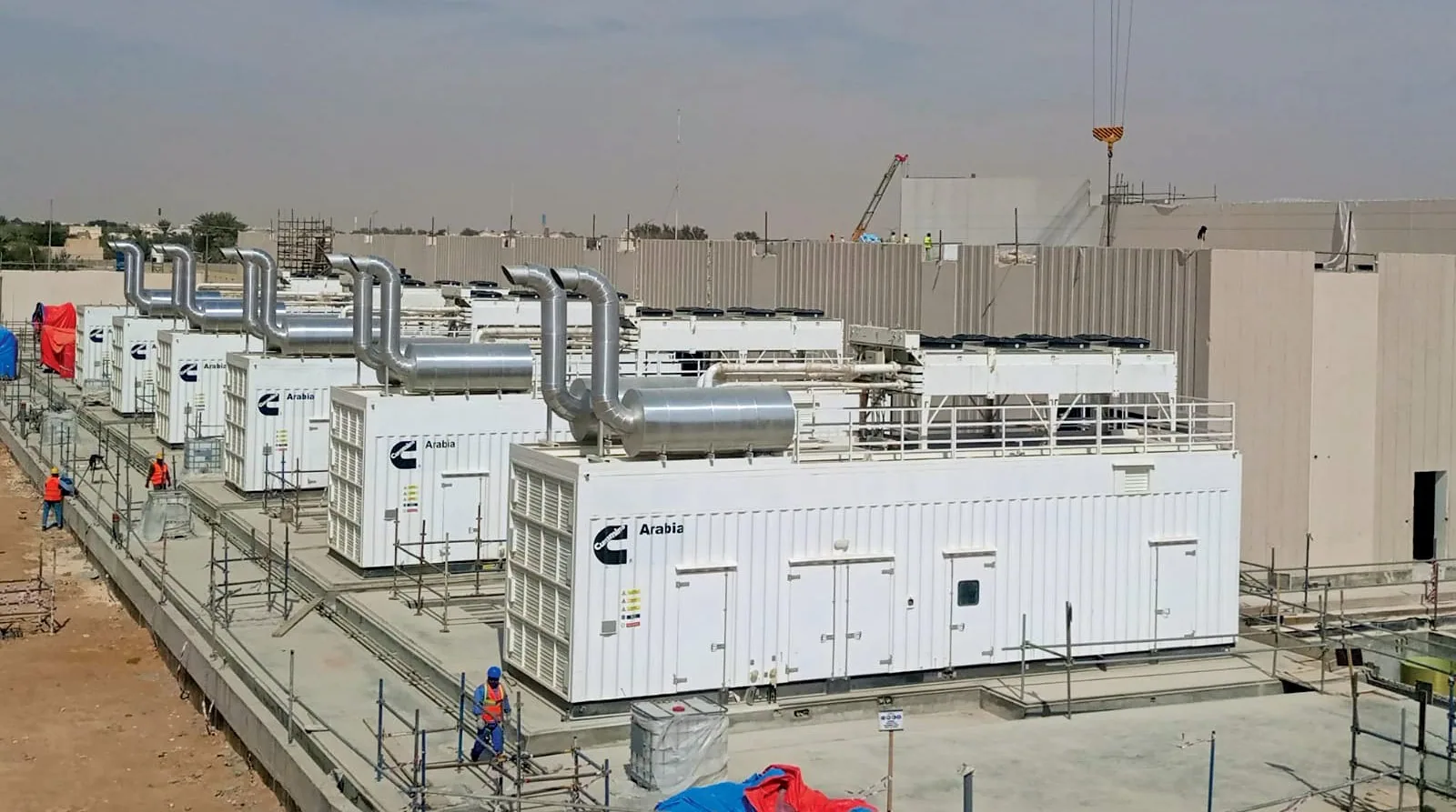 Row of Cummins standby generator sets at a job site — Fresno, CA