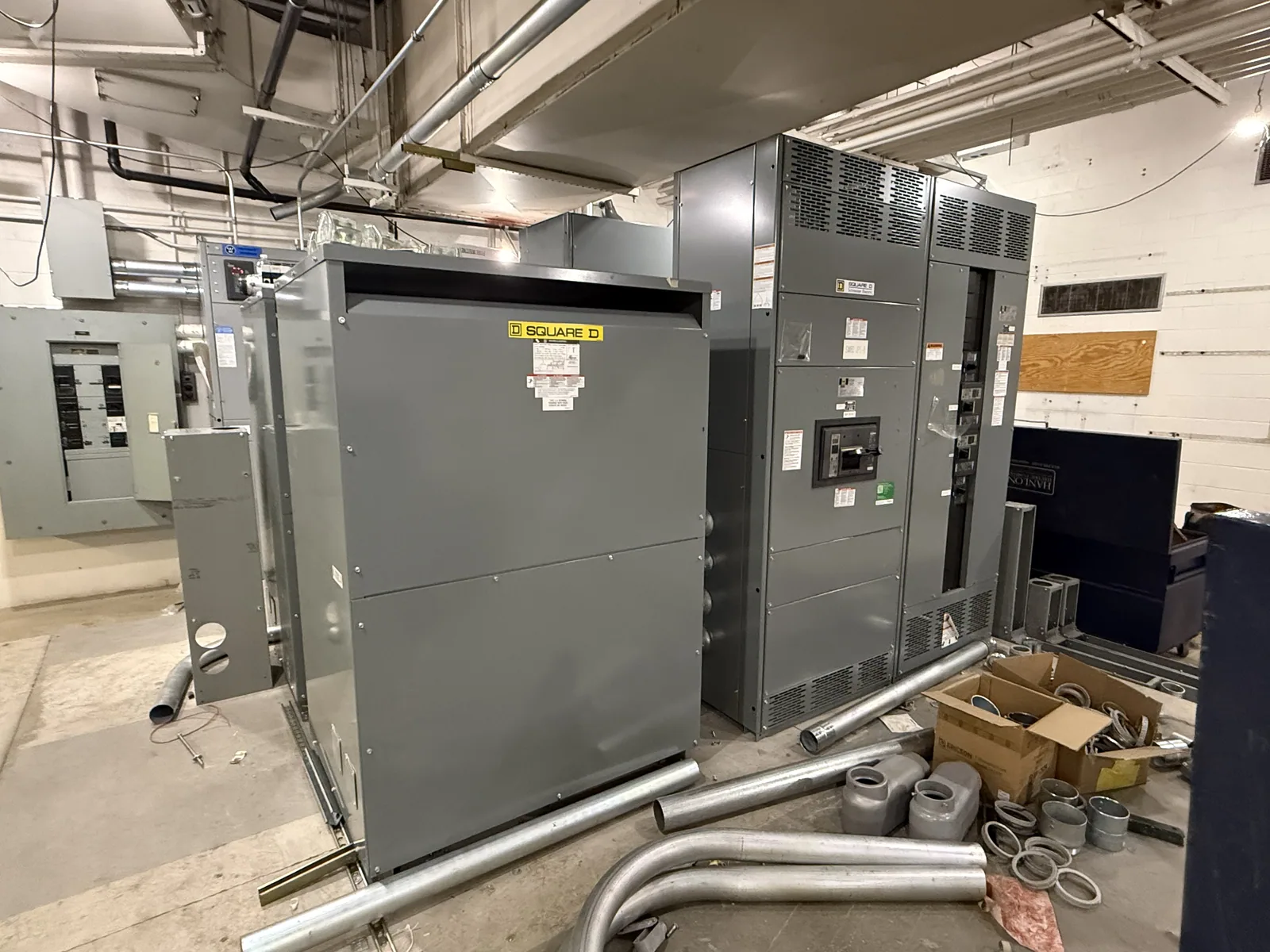 Switchgear and transformer installed in a plant electrical room — Oakland, CA